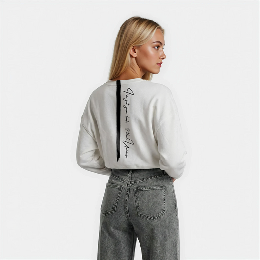 Back view of House of Malibu cropped white sweatshirt with vertical black stripe and “I’ve got your back – The Universe” quote