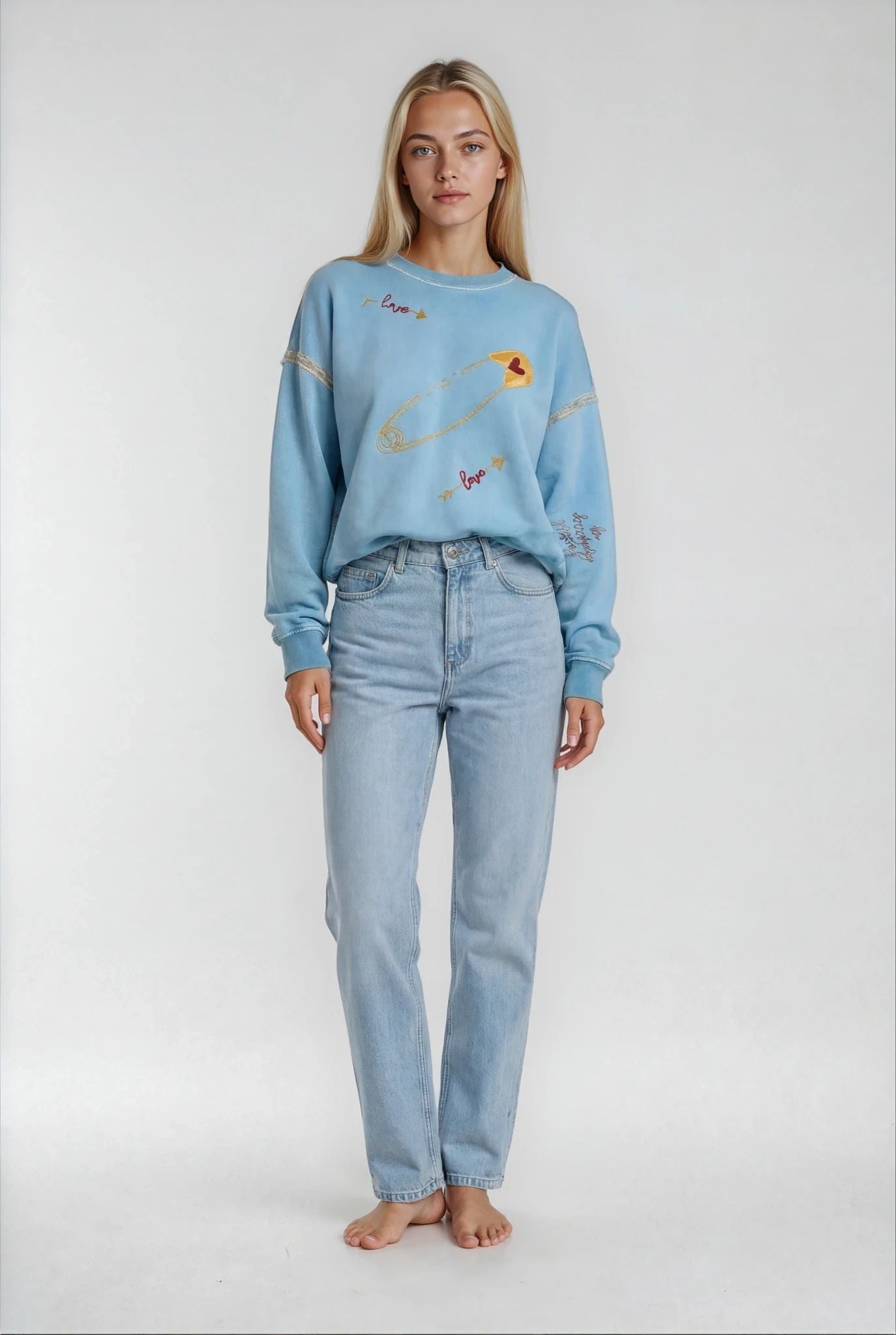House of Malibu light blue sweatshirt with hand-painted designs of love  art graphics and bows and arrows and heart pins