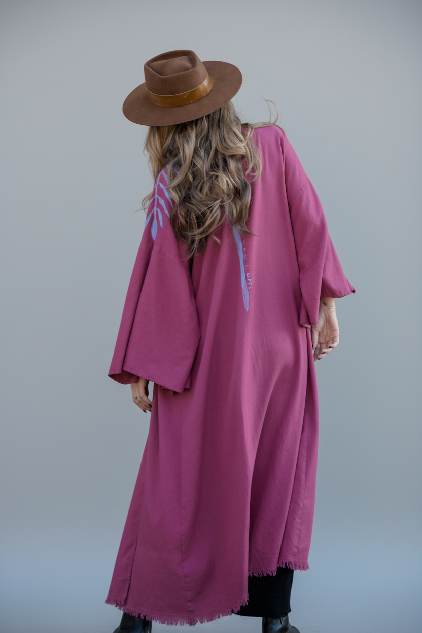 Woman wearing an ankle length raspberry kimono with periwinkle blue habd-painted spine stripe and quote "take me as i am" 