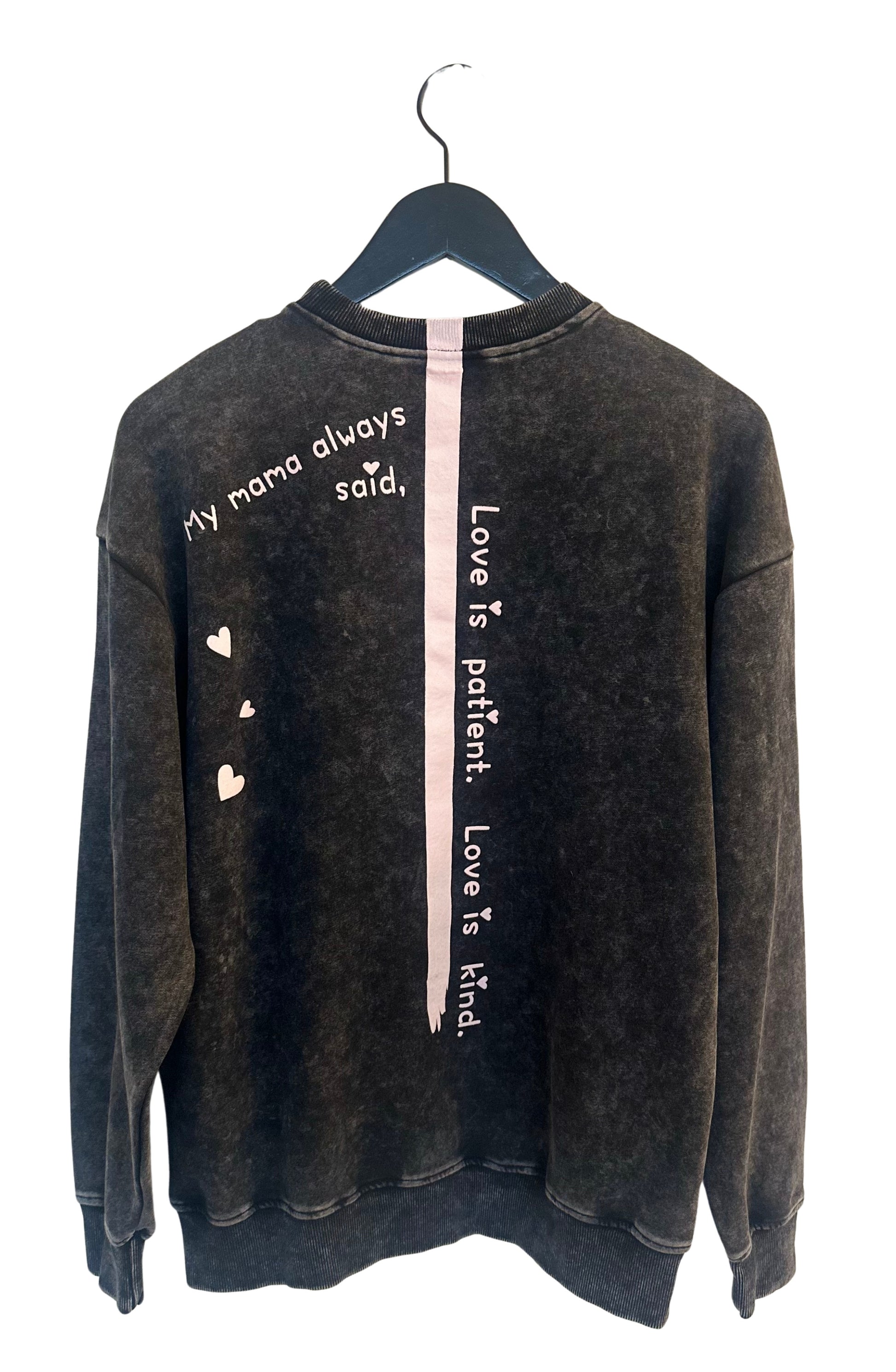 Back View  of House of Malibu Sweatshirt Washed Onyx Black with quote Mama Always Said Love is Patient Love is Kind
