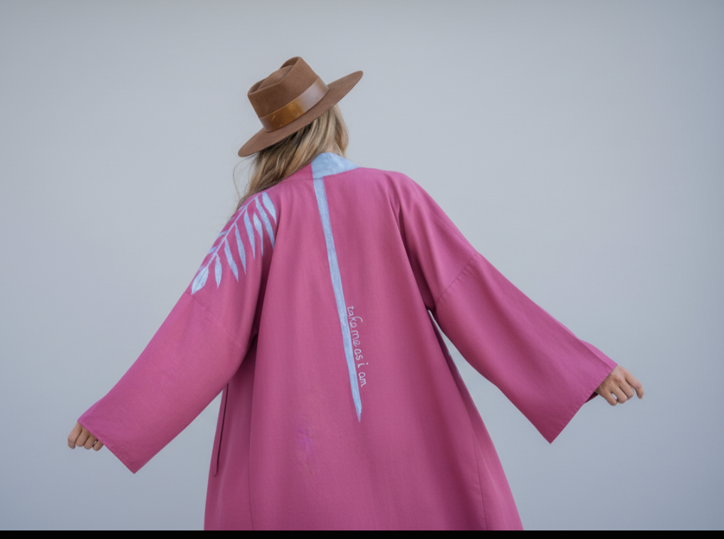 House of Malibu kimono worn by a woman showing the hand-painted details on the back 