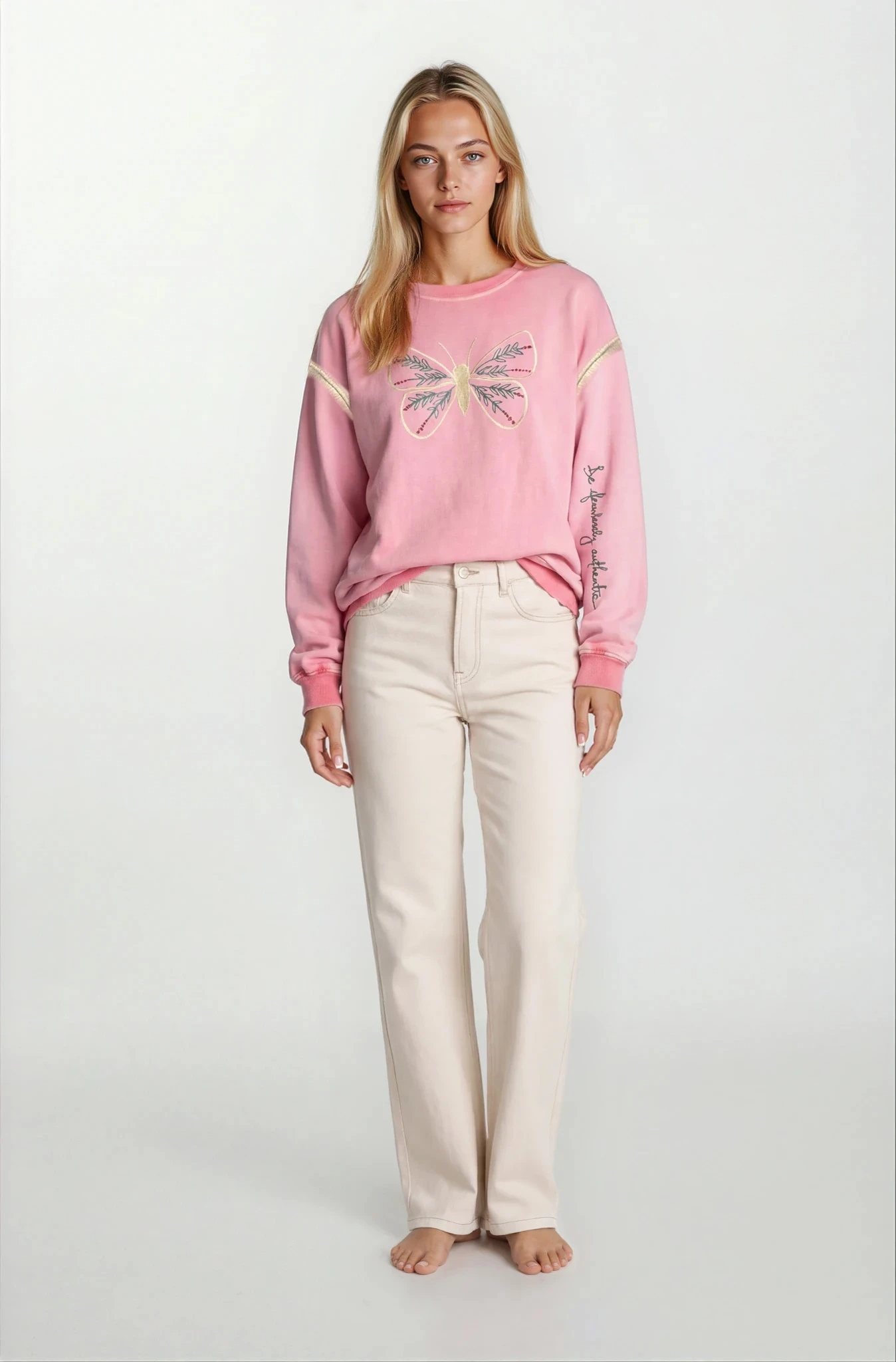 “Front view of House of Malibu hand-painted pink sweatshirt with butterfly design