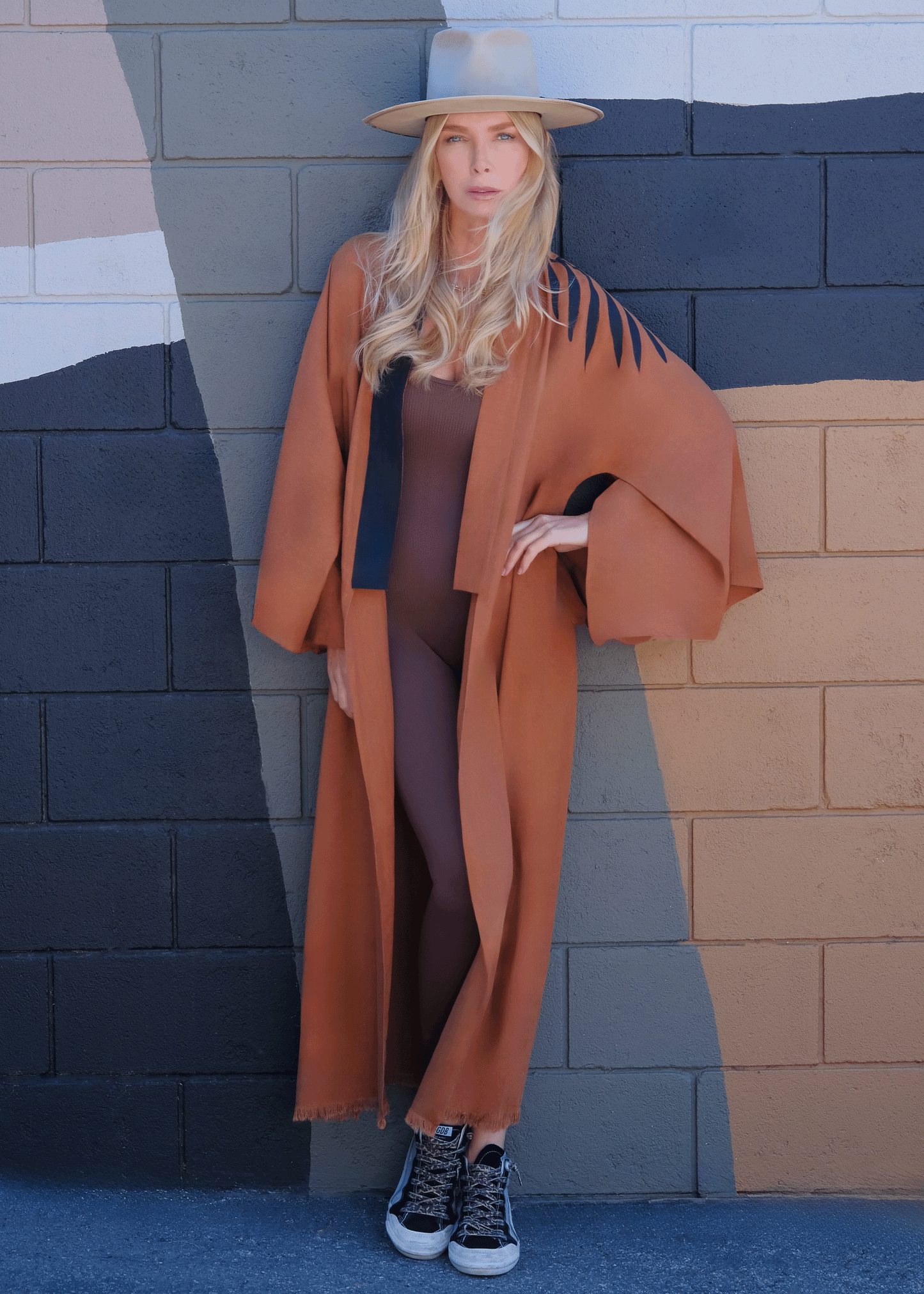 woman wearing a hand-painted house of malibu kimono 